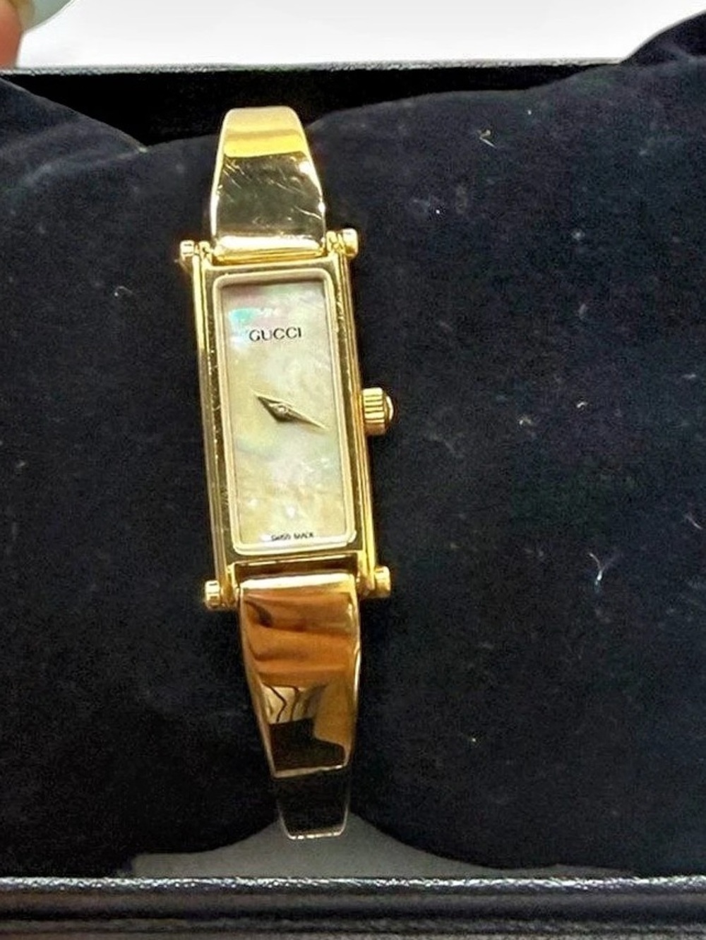 Gucci 1500 Mother of Pearl Gold-Tone Bangle Watch